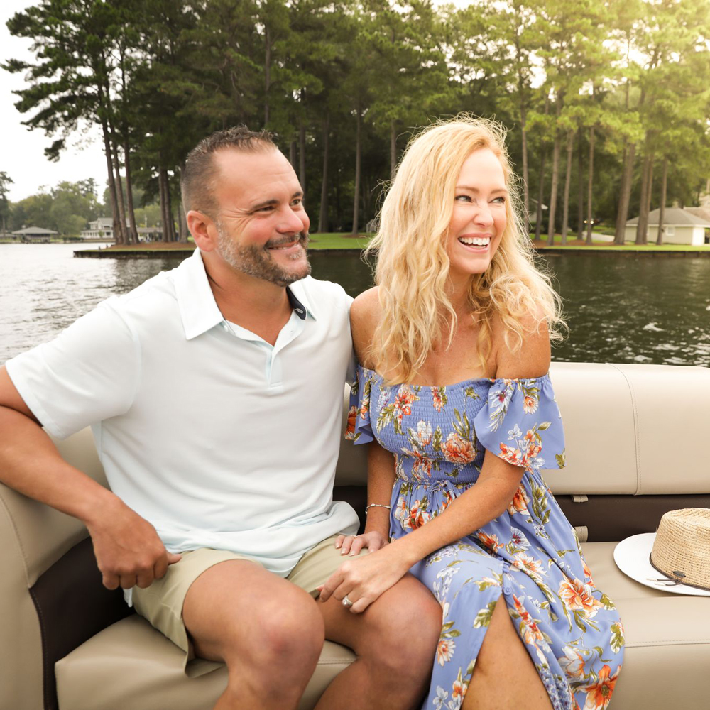 Couple smiling on boat