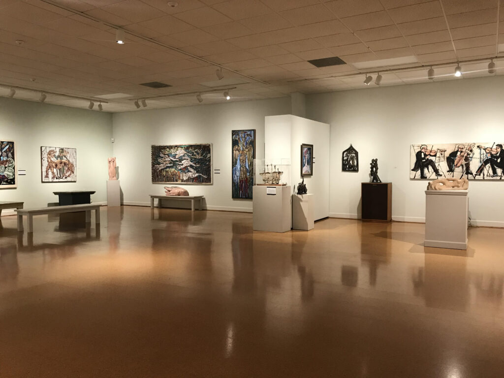 a photo of the Steffen Thomas Museum of Art gallery showing paintings and sculptures by Steffen Thomas